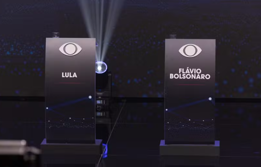 DEBATE NA BAND: Lula e Flávio Bolsonaro terão 30 minutos de confronto direto neste domingo (18)